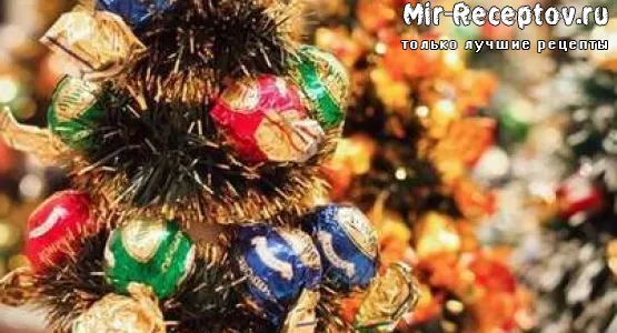 Сладкие сани с подарками с новогодней елкой из конфет